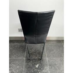 6 lederen zwarte designstoelen merk Montis Spica