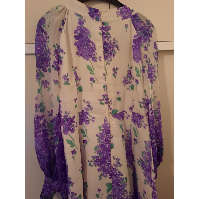 Lang kleed met bloemen motief